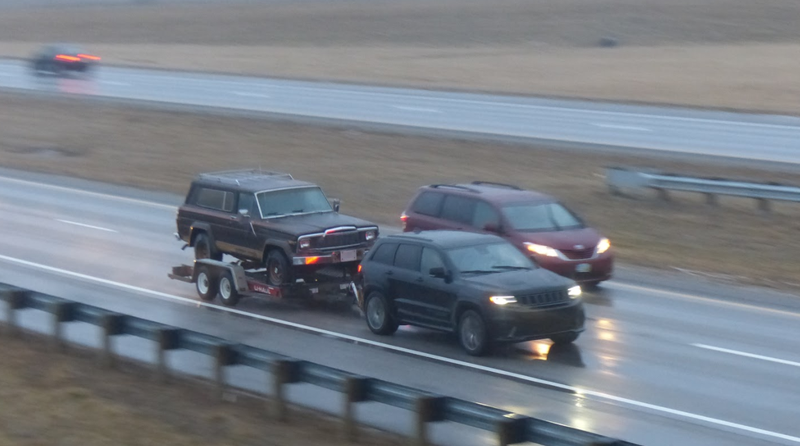 Illustration for article titled Towing An Old Jeep Through An Ice Storm With A 707 HP Jeep Grand Cherokee Trackhawk Was Truly Terrifying